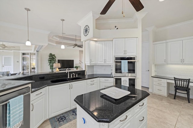 kitchen featuring white cabinets, sink, wine cooler, tasteful backsplash, and stainless steel double oven