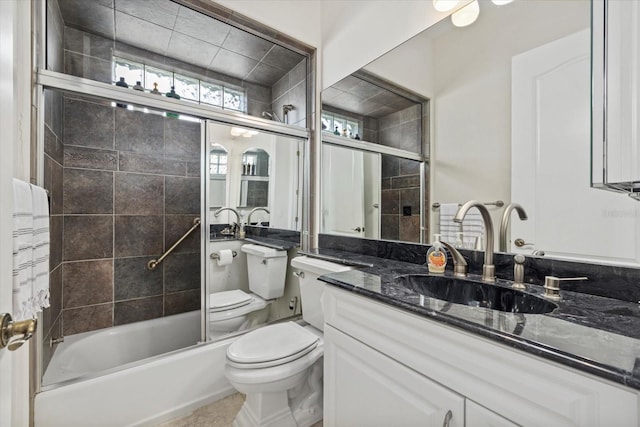 full bathroom featuring vanity, toilet, and enclosed tub / shower combo