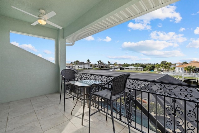 balcony featuring ceiling fan