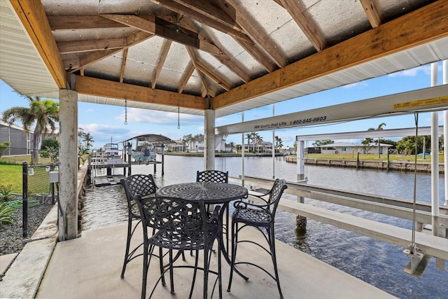 dock area featuring a water view