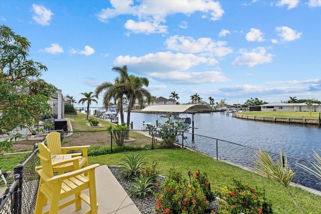 exterior space with a yard and a water view