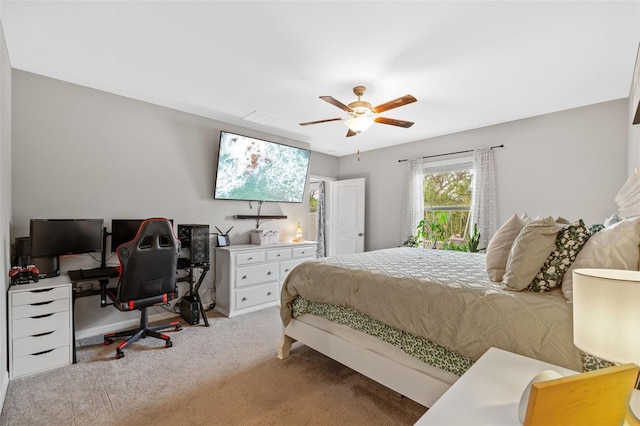 carpeted bedroom featuring ceiling fan