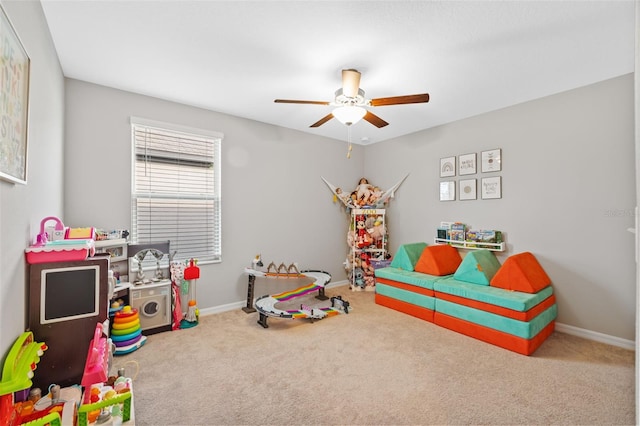 game room with ceiling fan and carpet floors