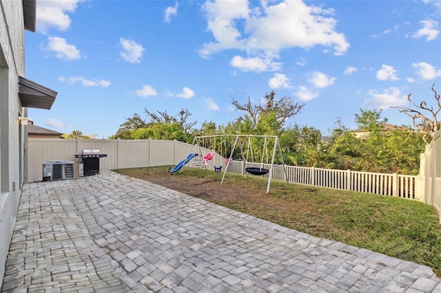 view of patio with a playground