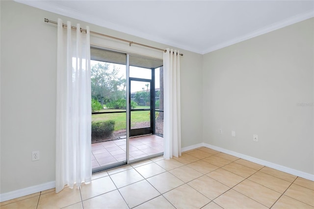 tiled spare room with ornamental molding