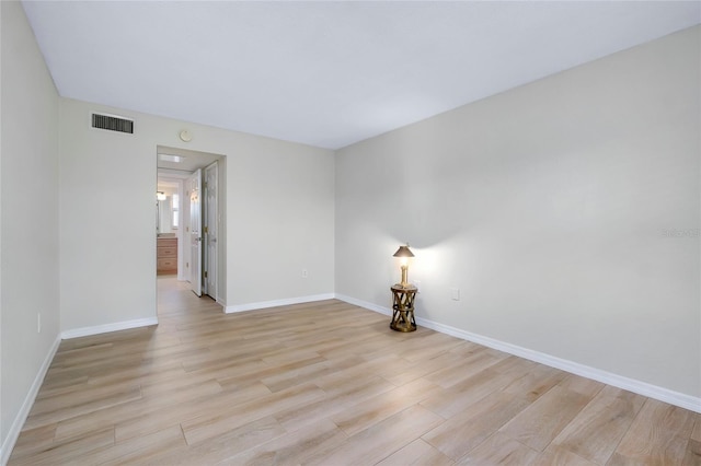 unfurnished room featuring light hardwood / wood-style flooring