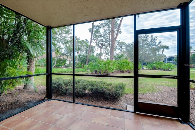 unfurnished sunroom with a wealth of natural light