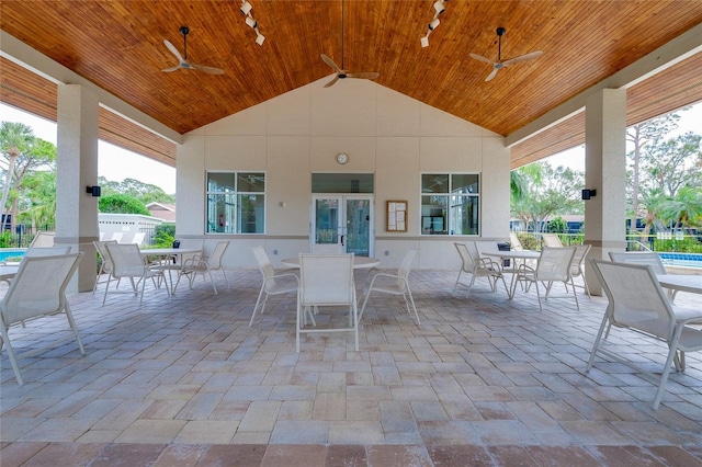 view of patio / terrace featuring ceiling fan and french doors