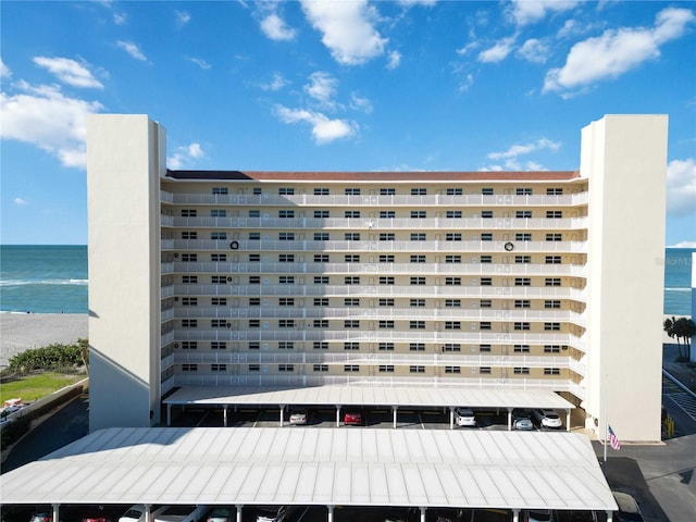 view of building exterior with a water view