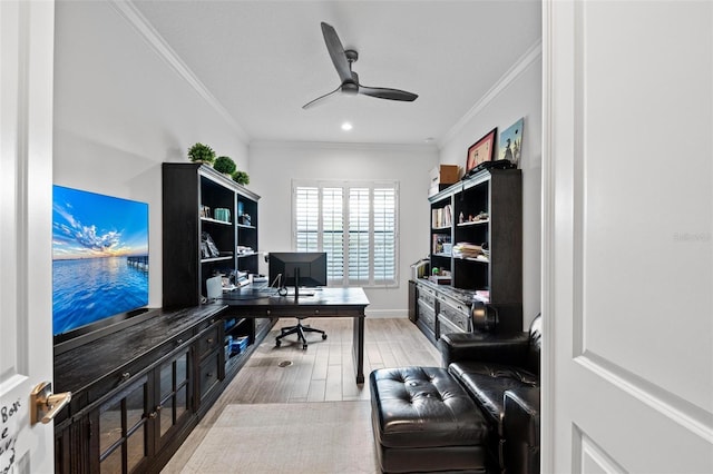 office featuring ornamental molding, ceiling fan, and light hardwood / wood-style floors