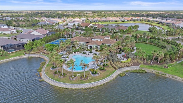 aerial view with a residential view and a water view