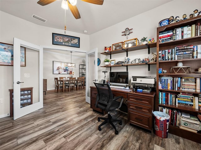 home office featuring ceiling fan, french doors, and hardwood / wood-style flooring