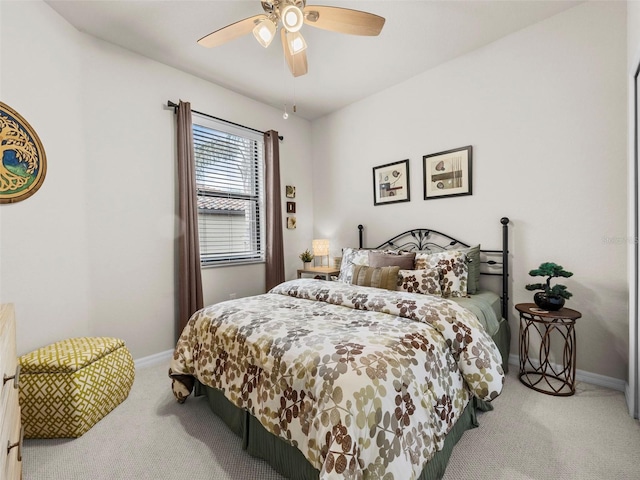 bedroom featuring ceiling fan and carpet flooring