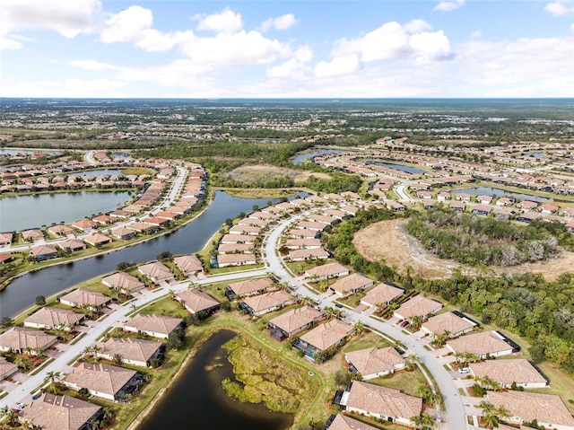 aerial view featuring a water view