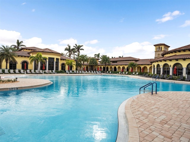 view of swimming pool featuring a patio area