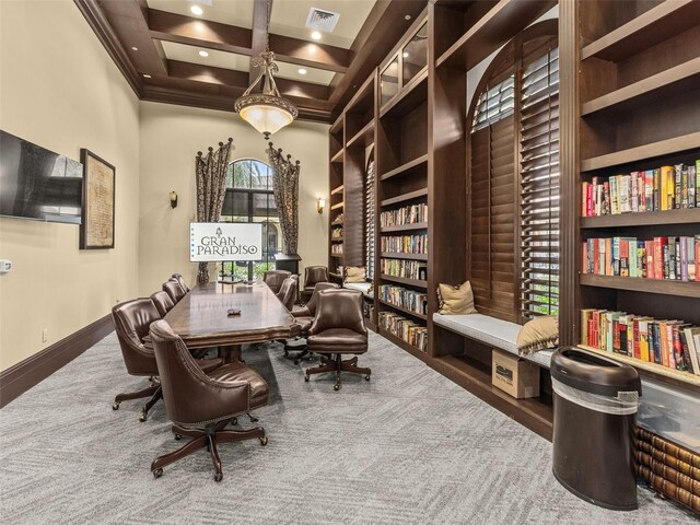 office space with built in features, beamed ceiling, and coffered ceiling