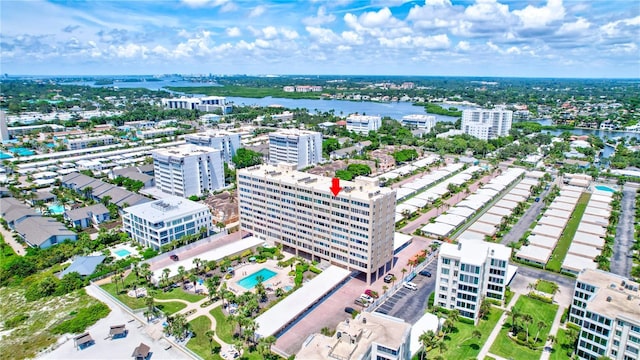 birds eye view of property featuring a water view