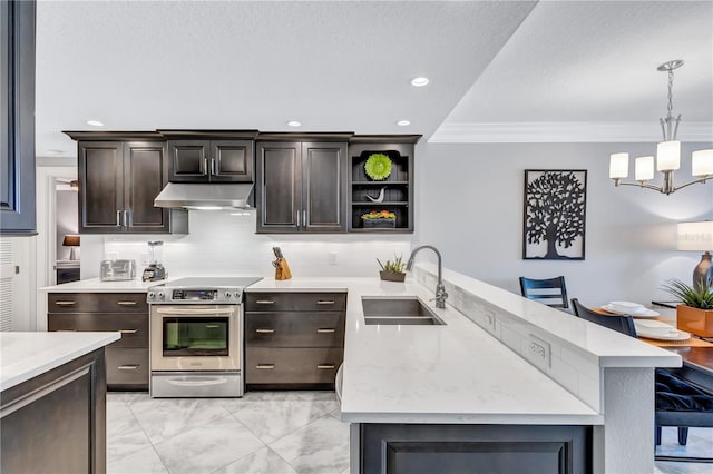 kitchen with stainless steel range with electric cooktop, sink, crown molding, decorative light fixtures, and a breakfast bar area