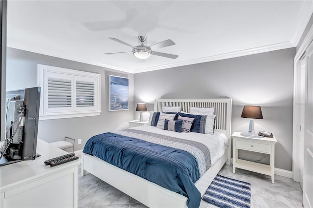 bedroom featuring ceiling fan and ornamental molding