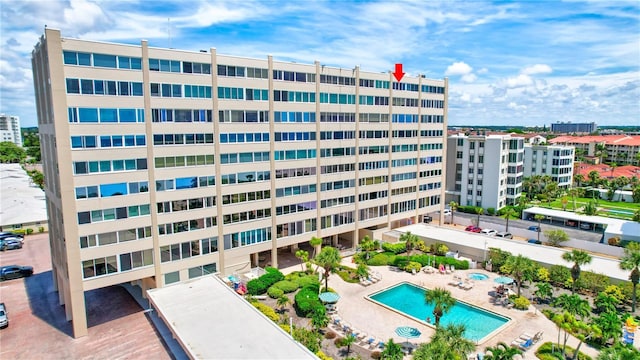 view of property featuring a community pool