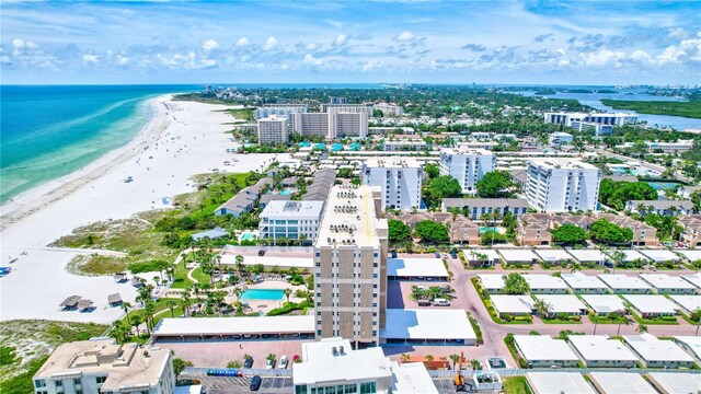 bird's eye view with a view of the beach and a water view