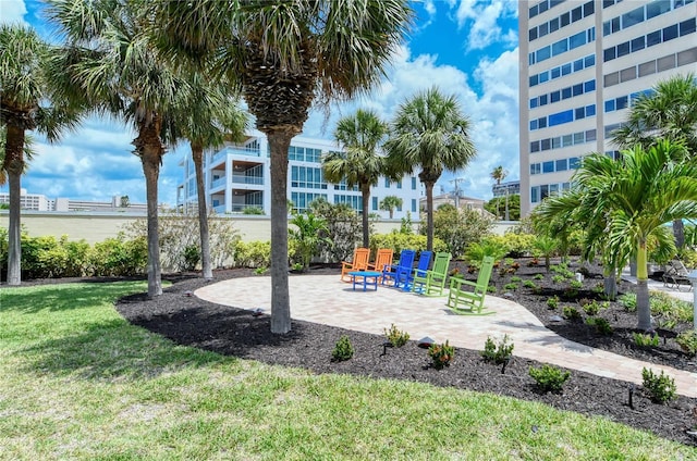 view of jungle gym with a lawn and a patio area