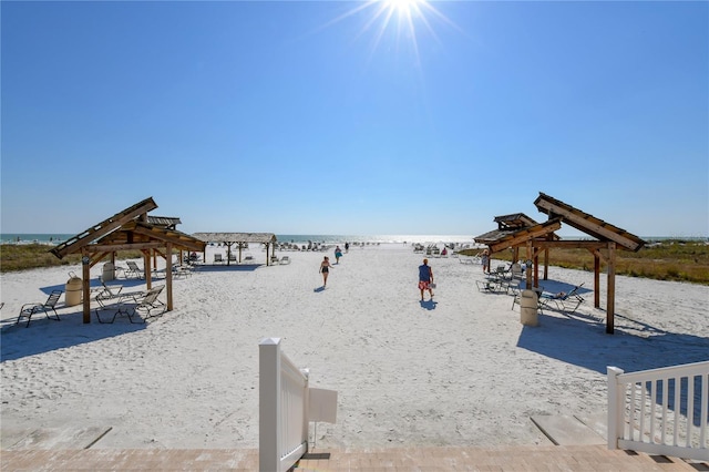 exterior space featuring a beach view