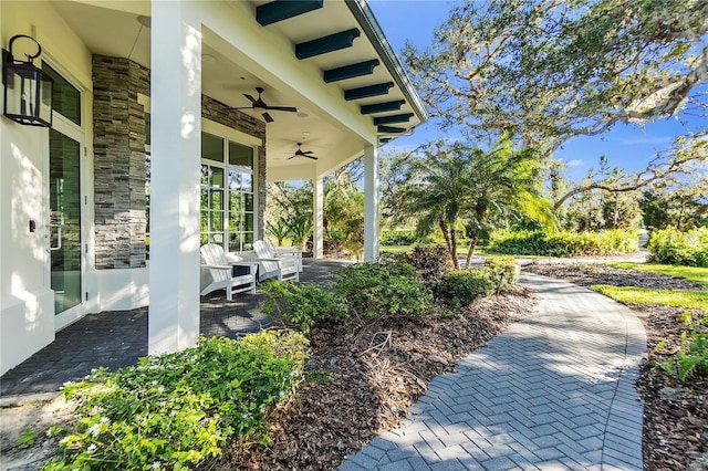 view of patio / terrace featuring a porch and ceiling fan