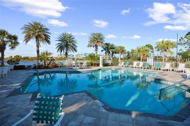 view of swimming pool featuring a patio area