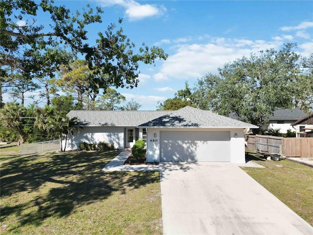 single story home with a garage and a front yard