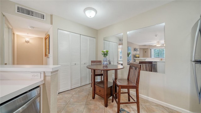 view of tiled dining space