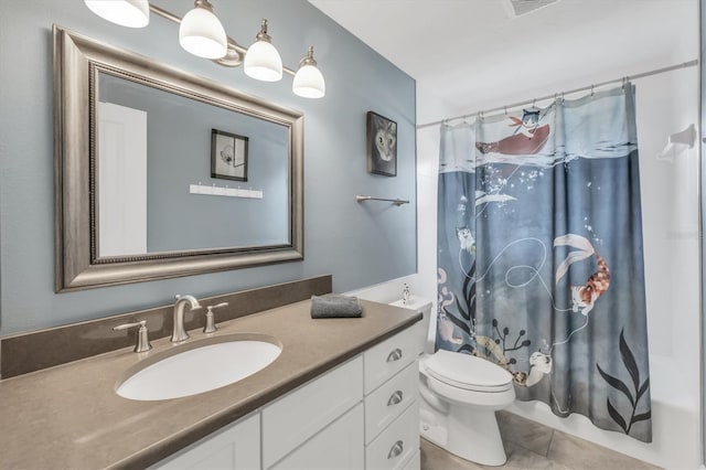 full bathroom with tile patterned floors, toilet, vanity, and shower / tub combo with curtain