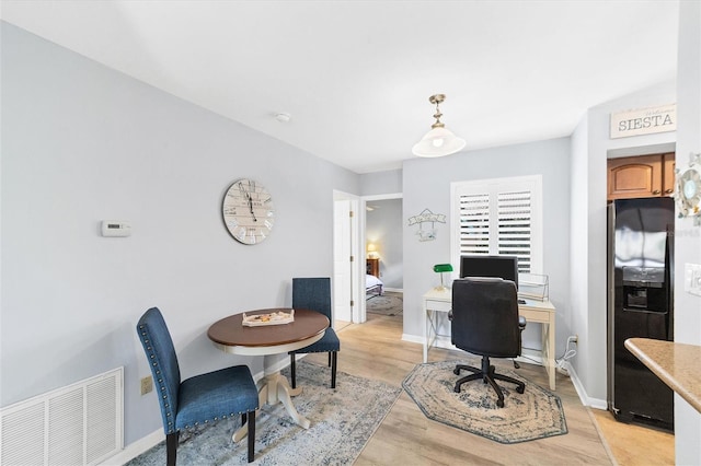 office featuring light hardwood / wood-style floors