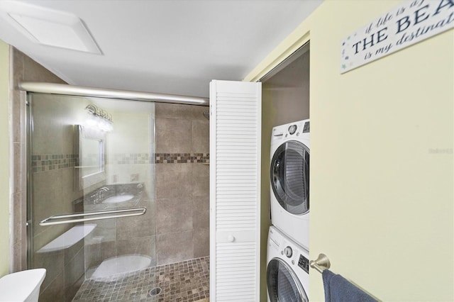 interior space with stacked washing maching and dryer