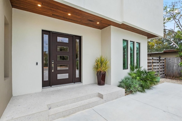 doorway to property with a patio area