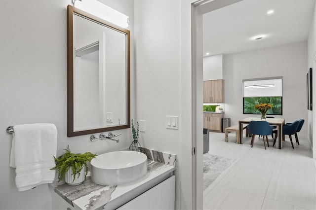 bathroom featuring vanity and tile patterned flooring