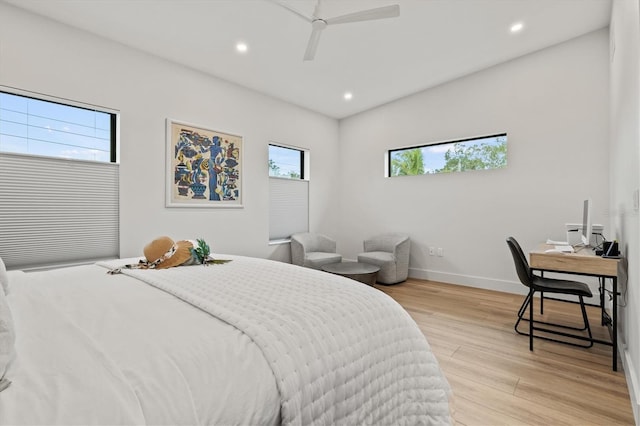 bedroom featuring ceiling fan and light hardwood / wood-style flooring