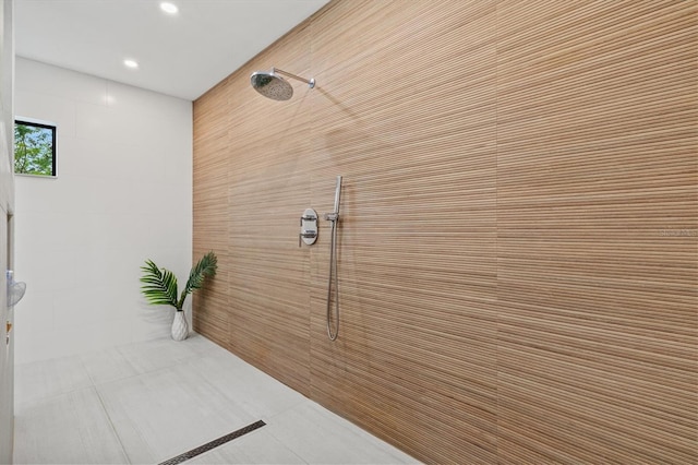 bathroom with a tile shower