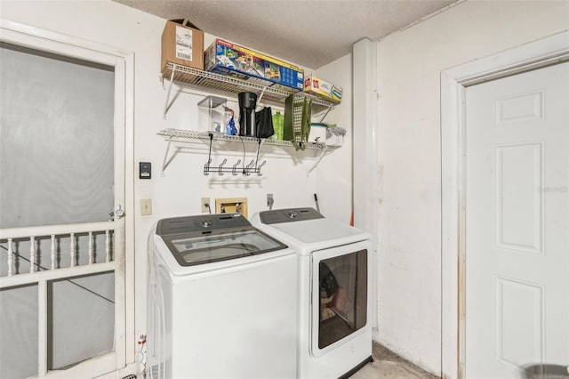 laundry area featuring washer and clothes dryer