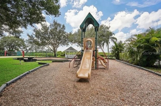 view of jungle gym featuring a yard