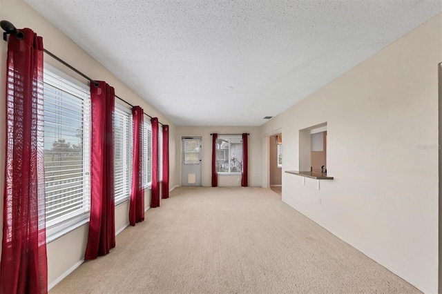 interior space with a textured ceiling