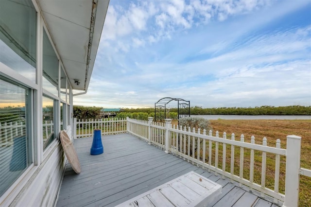 deck featuring a water view