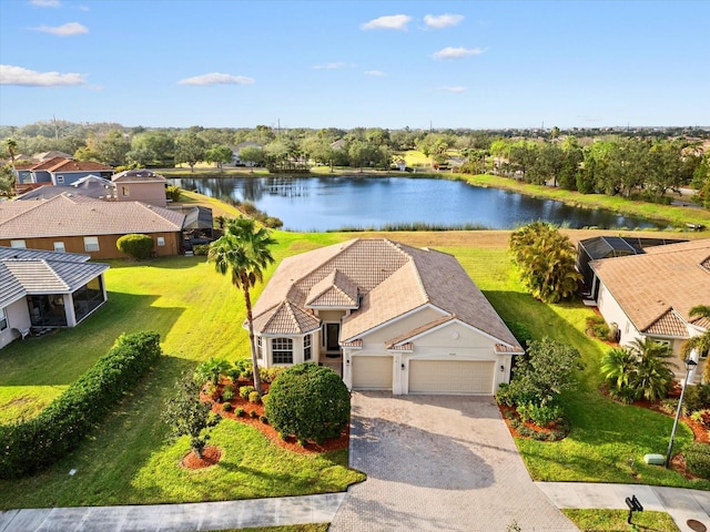 drone / aerial view with a water view