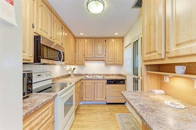 kitchen featuring dishwasher, sink, tasteful backsplash, white electric range oven, and light hardwood / wood-style floors