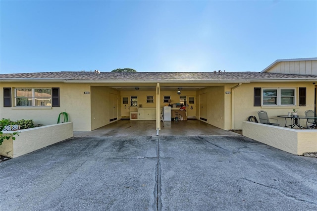 exterior space featuring a carport