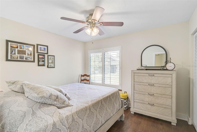 bedroom featuring ceiling fan and dark wood-type flooring