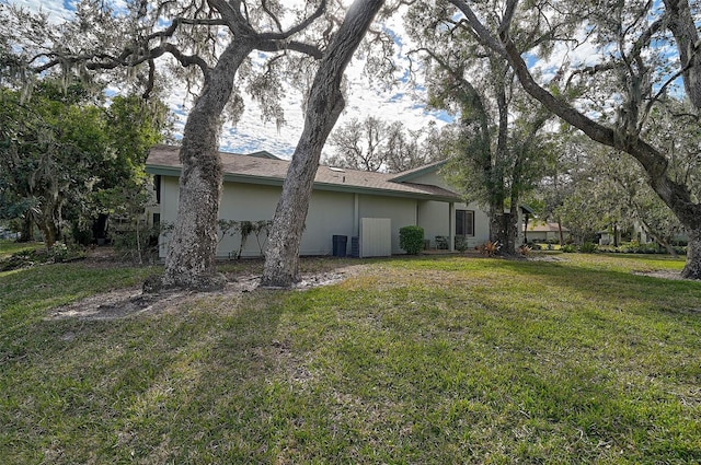 view of property exterior featuring a yard