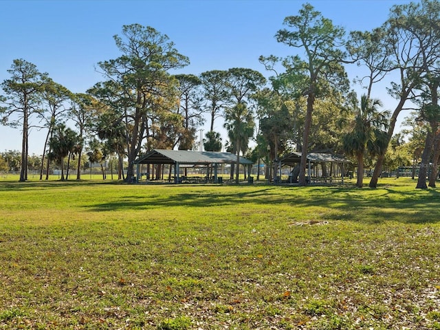 view of community with a gazebo and a yard