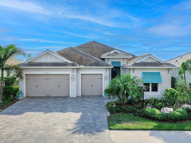 ranch-style house featuring a garage