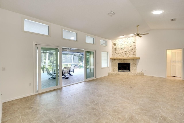 unfurnished living room featuring a fireplace, high vaulted ceiling, and ceiling fan